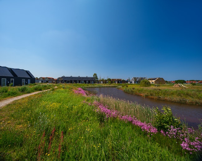 Woonproject de Tuunen Woontij Texel — prefab houtbouw project van Skilpod