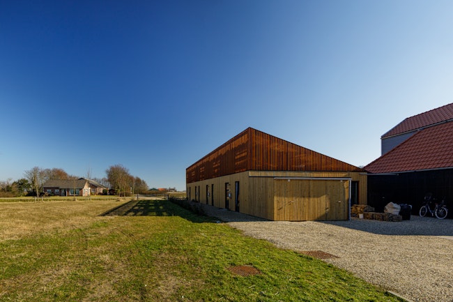 Woonproject de Tuunen Woontij Texel — prefab houtbouw project van Skilpod