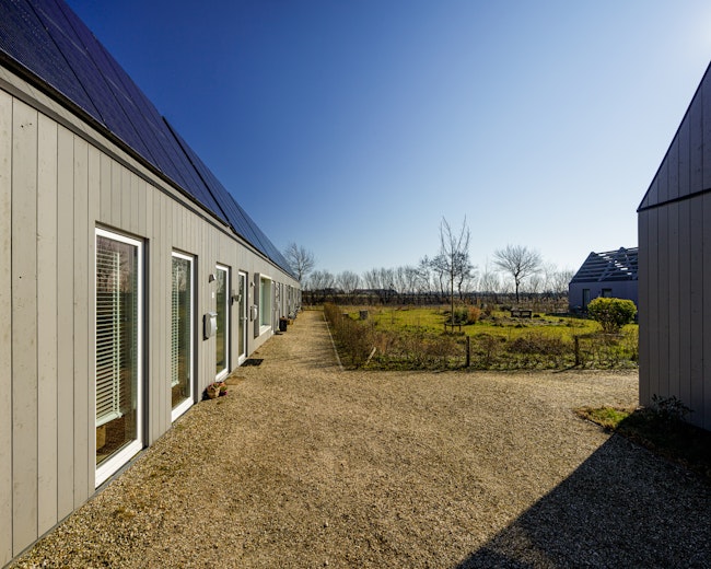 Woonproject de Tuunen Woontij Texel — prefab houtbouw project van Skilpod